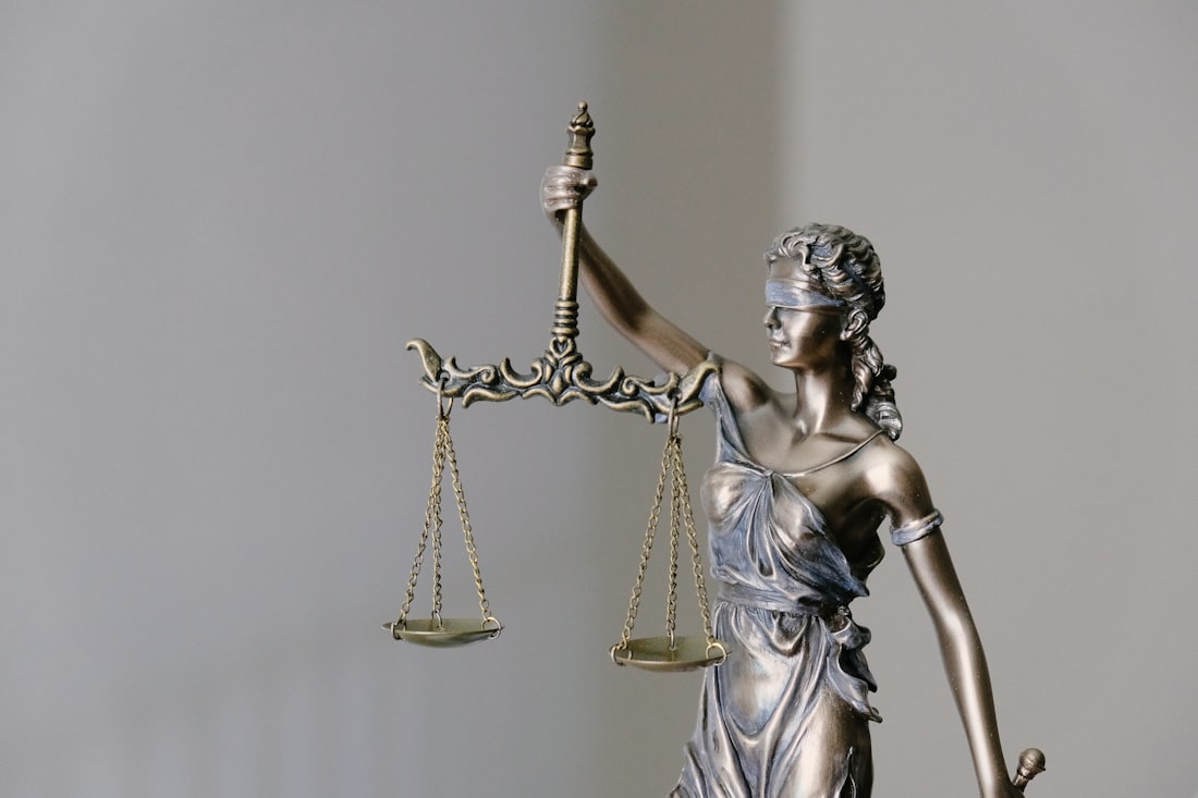 lady justice statue with scales and sword