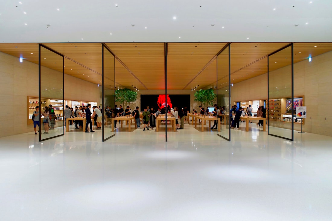 people walking on white floor tiles