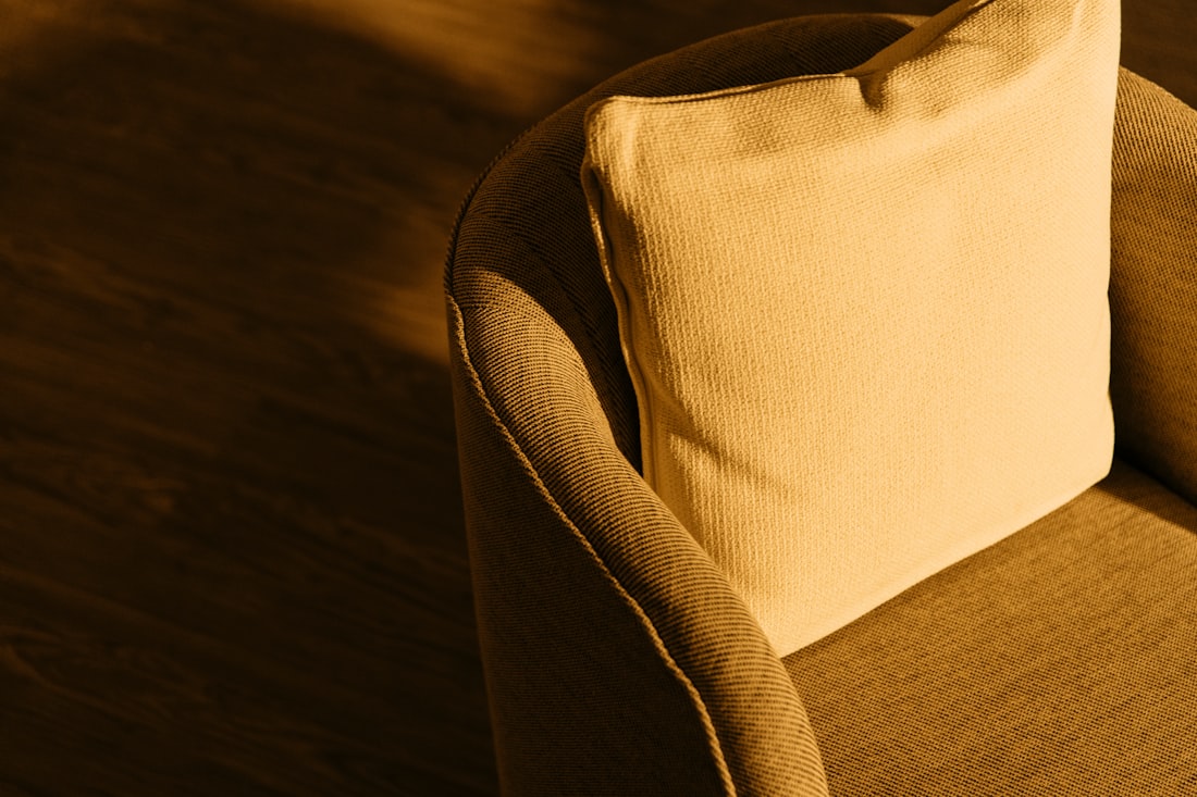 a close up of a cushion on a chair