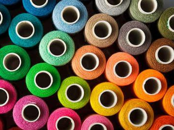 Al Qamar Al Fiddi Textile Trading L.l.c